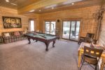 Terrace level game room with tournament quality pool table 